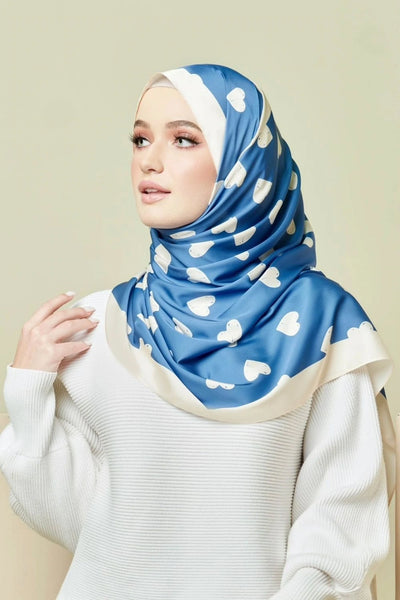 Blue hijab with white cloud pattern