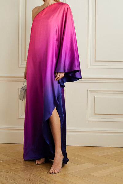 One-shoulder silk dress with a gradient from pink to purple and an elegant high slit