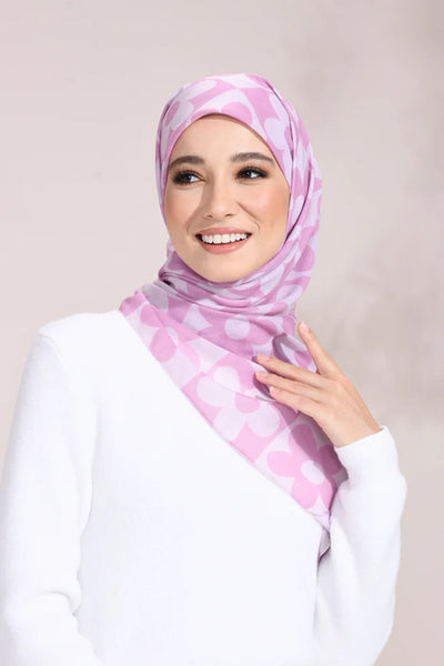 Floral Embrace Hijab with pink and white flower pattern on a model, ideal for a chic, modest look