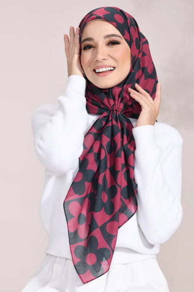 Elegant Rosette Silhouette Hijab with floral pattern in shades of pink and grey, ideal for style and comfort