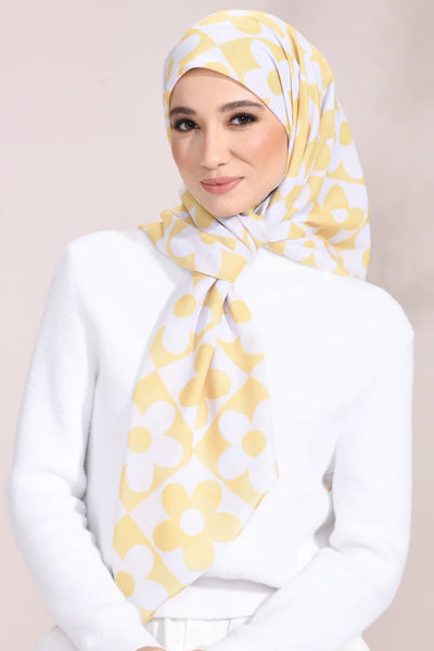 Yellow and white floral patterned hijab, elegant modest fashion accessory for diverse styles